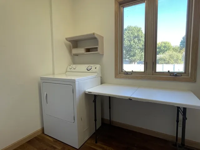 a utility room with dryer and washer