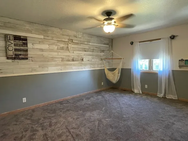 a view of an empty room with a sink