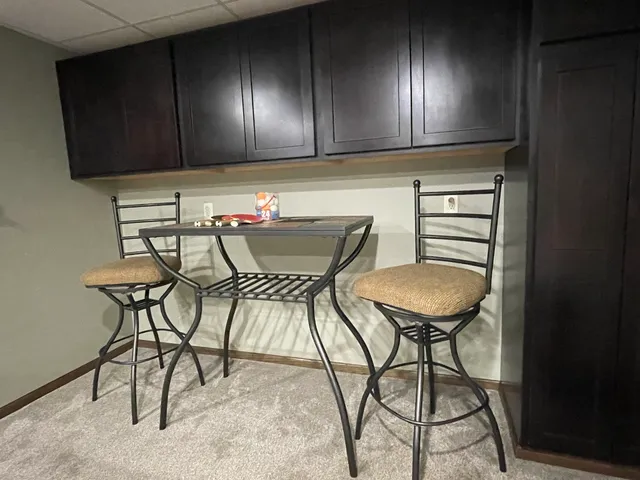 a view of a kitchen with cabinets