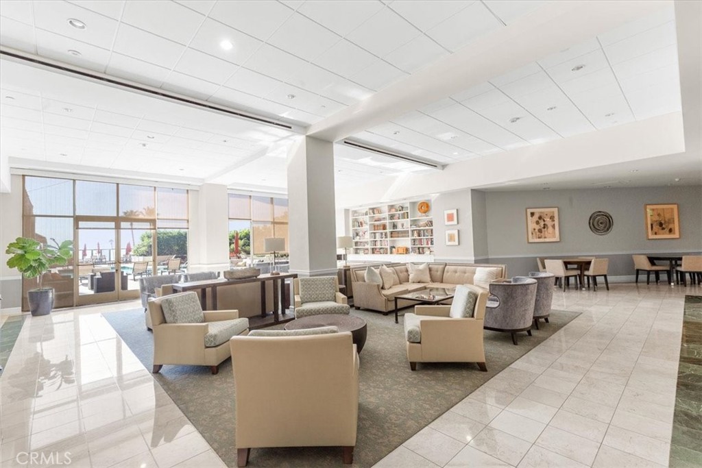 850 East Ocean Boulevard, Unit 209 Long Beach, CA 90802 - Photo 15 of 15 a living room with furniture and a large window