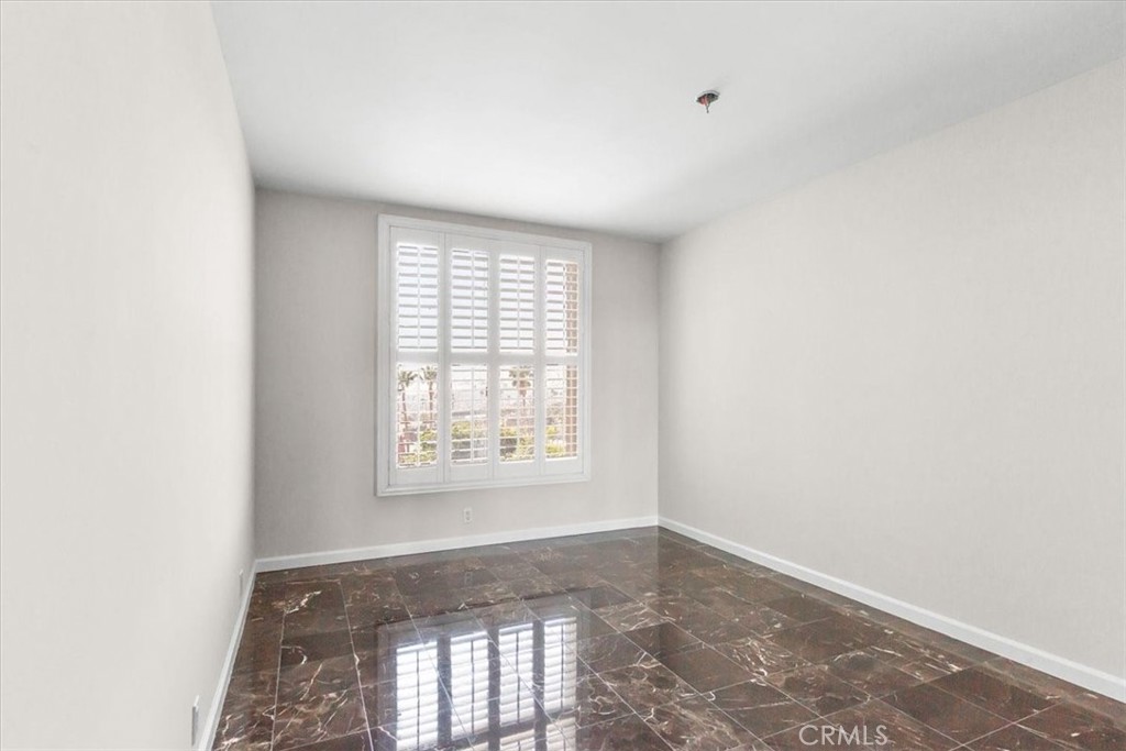 850 East Ocean Boulevard, Unit 209 Long Beach, CA 90802 - Photo 9 of 15 a view of an empty room with a window