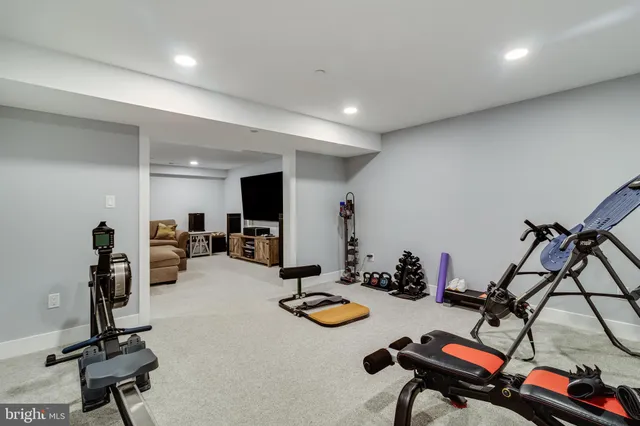 a room with gym equipment and gym equipment
