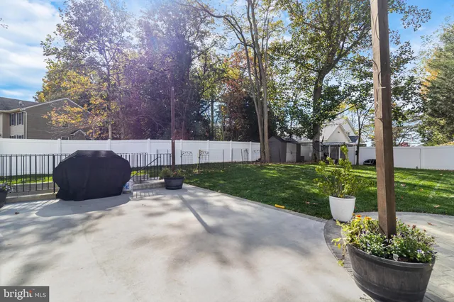 a view of a couches in backyard of house