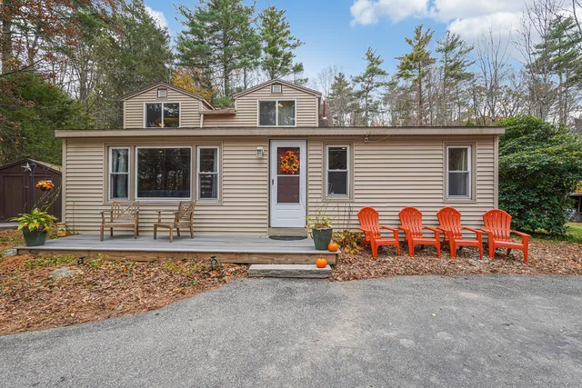 a front view of a house with a garage