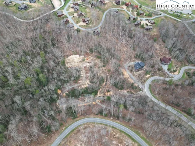 a view of a street with cars