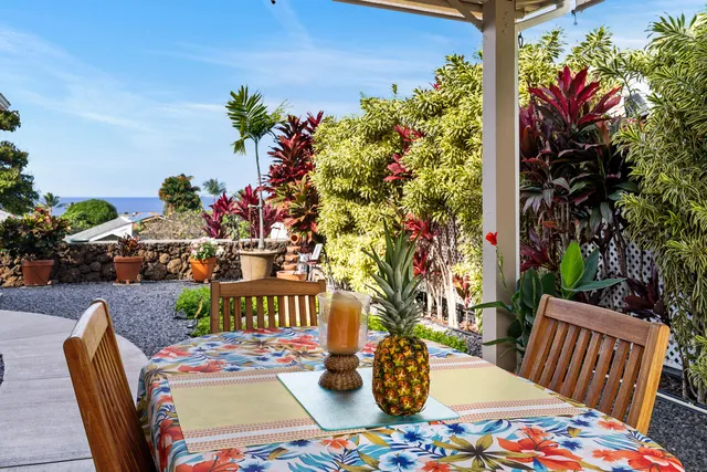 a view of an outdoor dining space with furniture