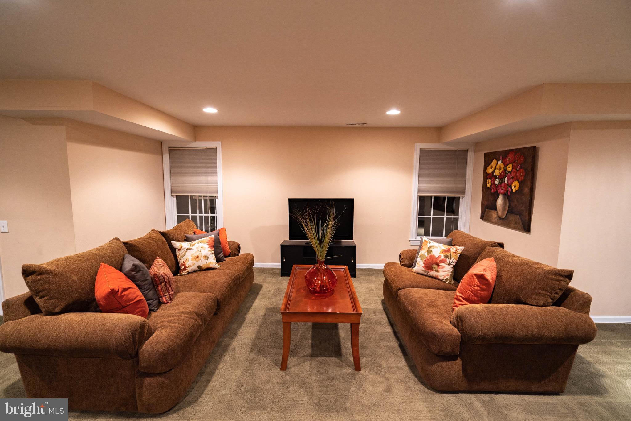 17 Eagleton Farm Road Newtown, PA 18940 - Photo 60 of 85 BASEMENTFAMILY ROOM WITH WALKOUT TO POOL WITH OUT