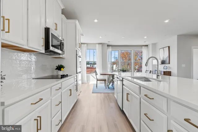 a large kitchen with cabinets