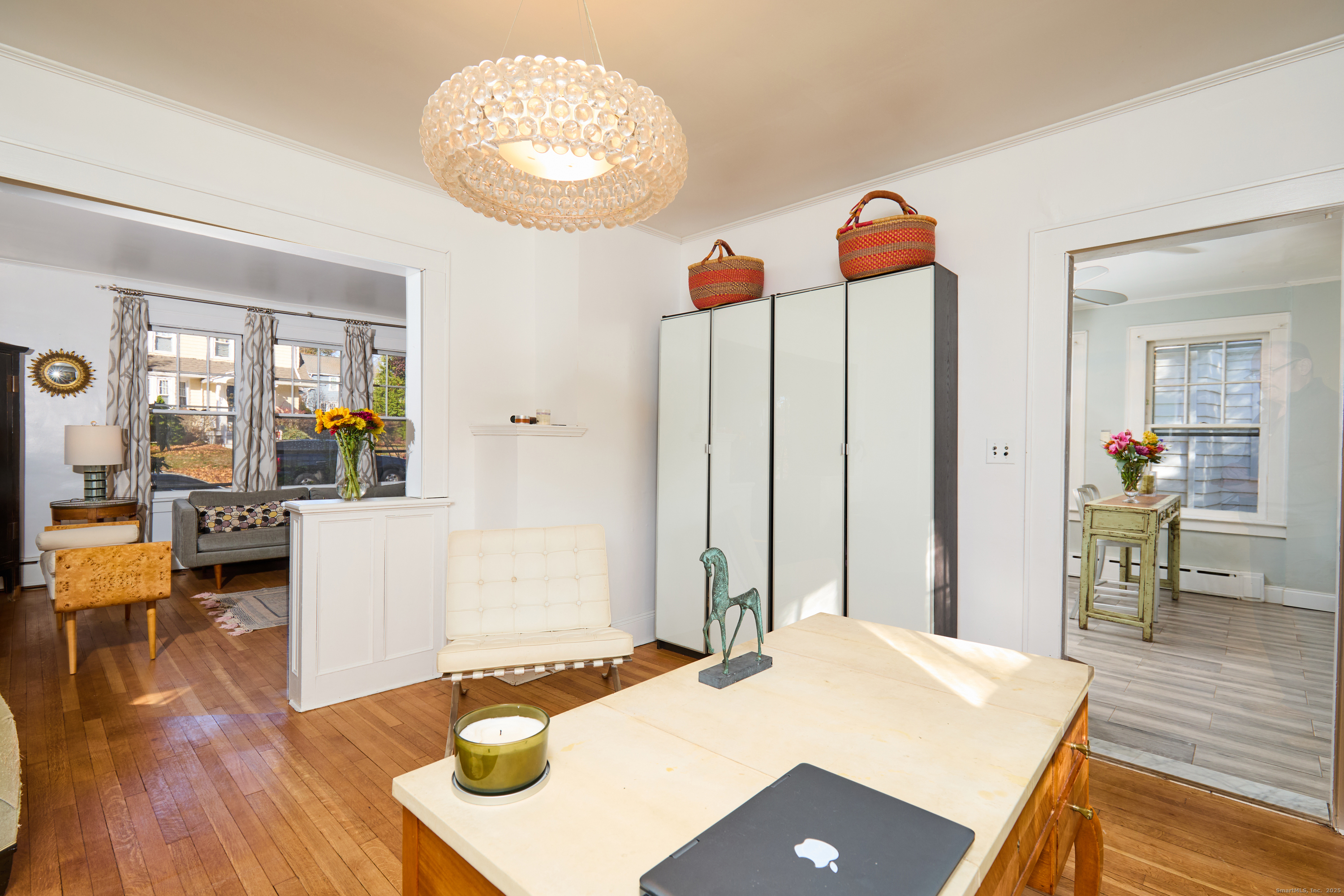 155 Moody Avenue Fairfield, CT 06825 - Photo 16 of 34 a workspace with furniture and wooden floor