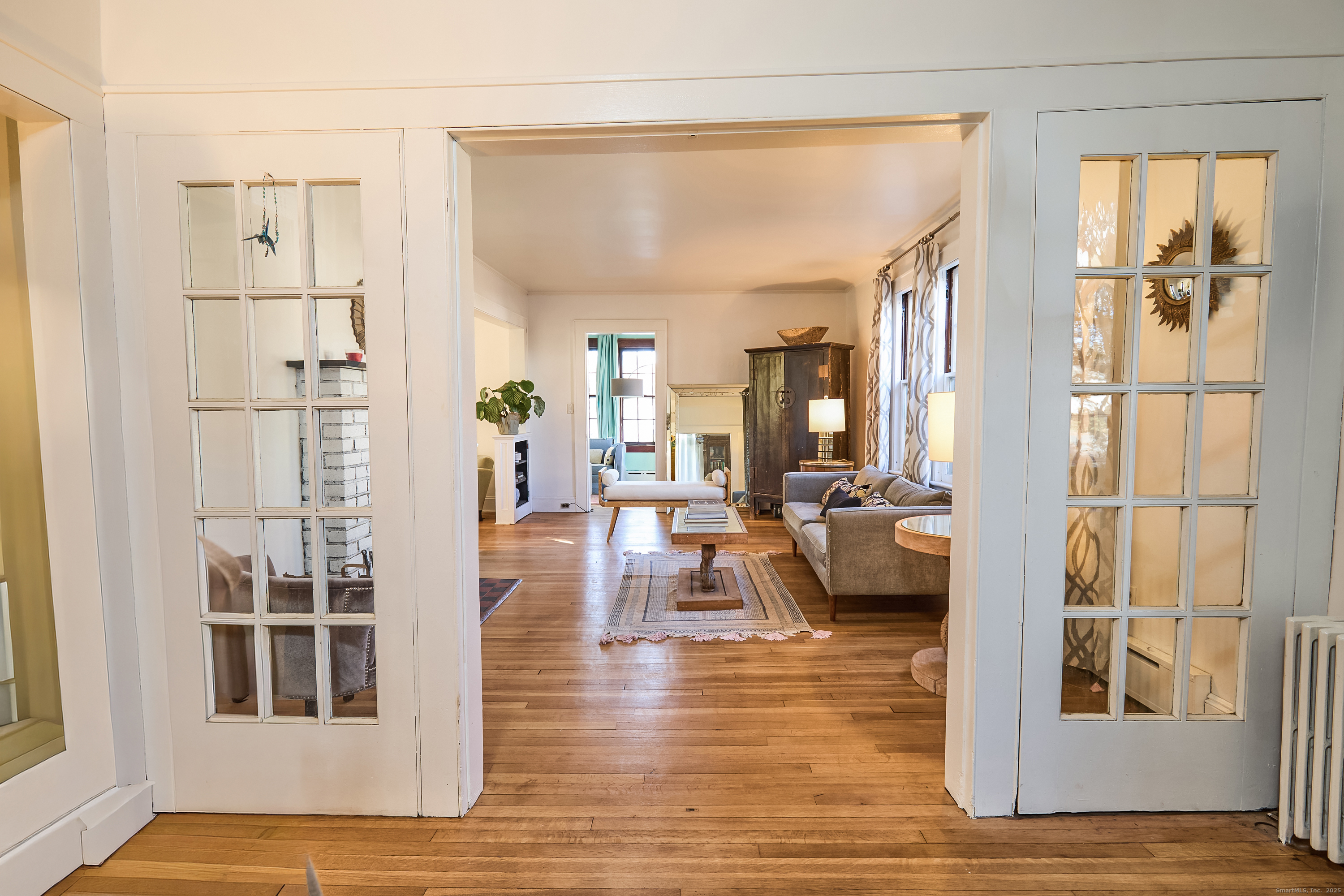 155 Moody Avenue Fairfield, CT 06825 - Photo 3 of 34 a living room with furniture and a table