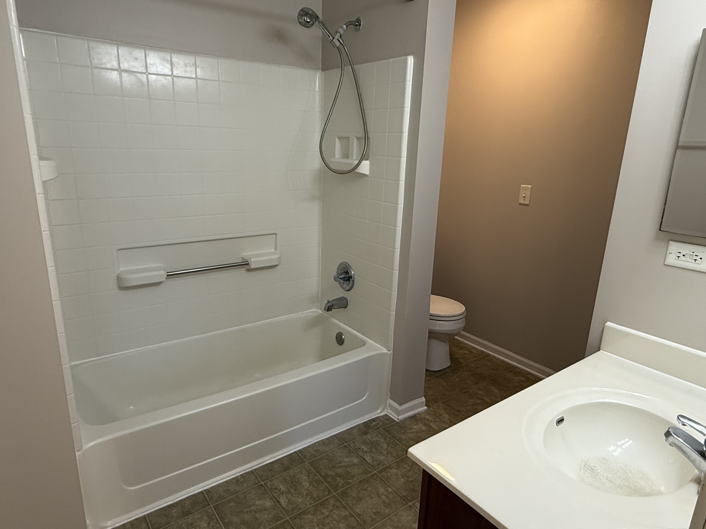 1403 Fabiola Court South Minooka, IL 60447 - Photo 23 of 30 a bathroom with a sink a toilet and shower