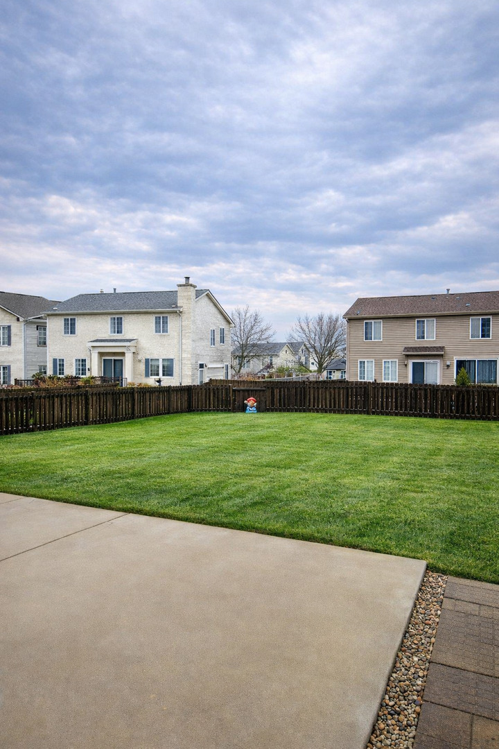 1403 Fabiola Court South Minooka, IL 60447 - Photo 27 of 30 a view of building with outdoor space and street view