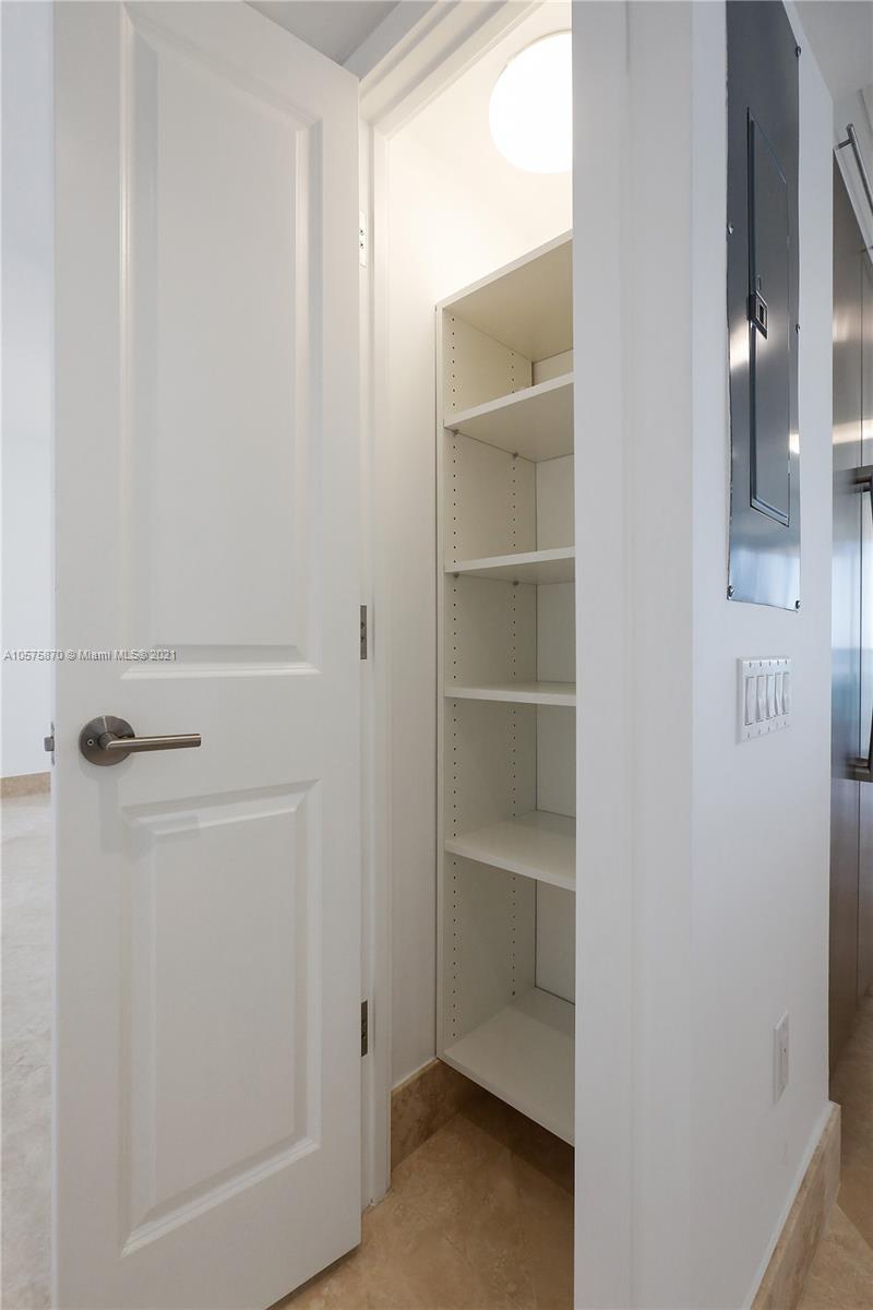 8925 Collins Avenue, Unit 9B Surfside, FL 33154 - Photo 24 of 46 a view of a walk in closet