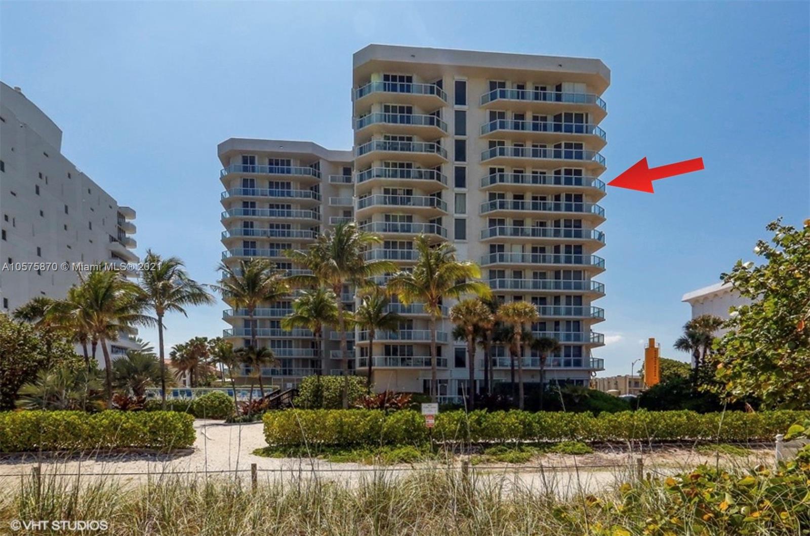 8925 Collins Avenue, Unit 9B Surfside, FL 33154 - Photo 25 of 46 a front view of a building with a yard