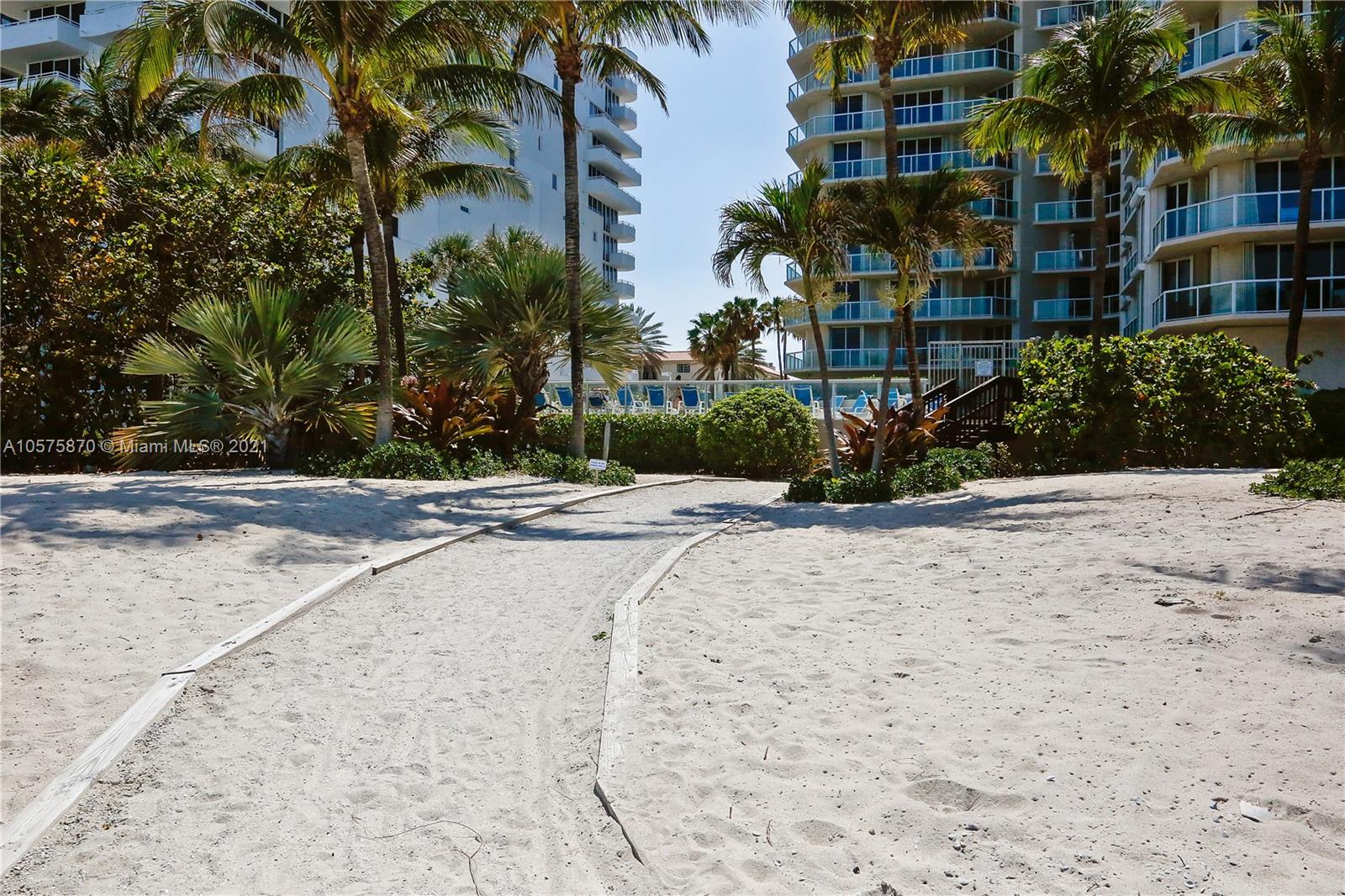 8925 Collins Avenue, Unit 9B Surfside, FL 33154 - Photo 31 of 46 a view of multiple houses with a street