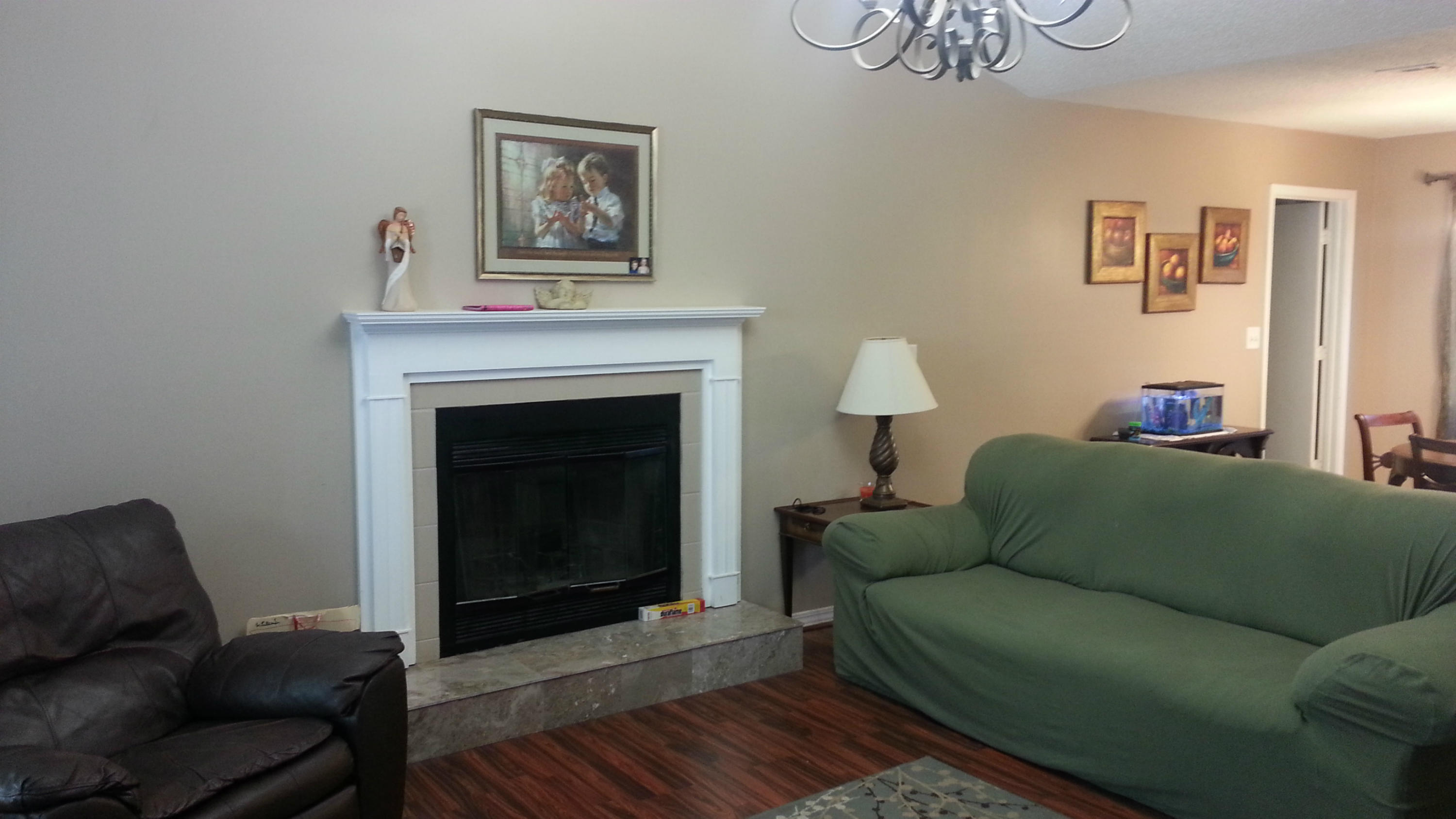 348 John King Road Crestview, FL 32539 - Photo 2 of 19 a living room with furniture and a fireplace