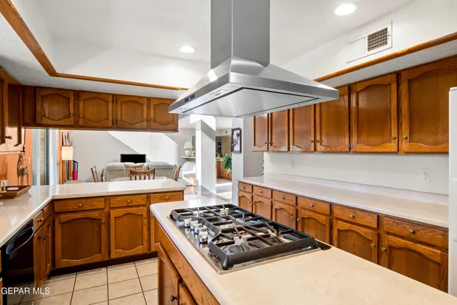 a bedroom with bed and wooden floor