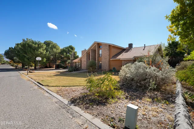 a view of a street with a building in the background
