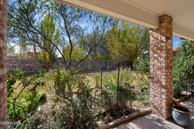 a view of a house with a snow in the yard