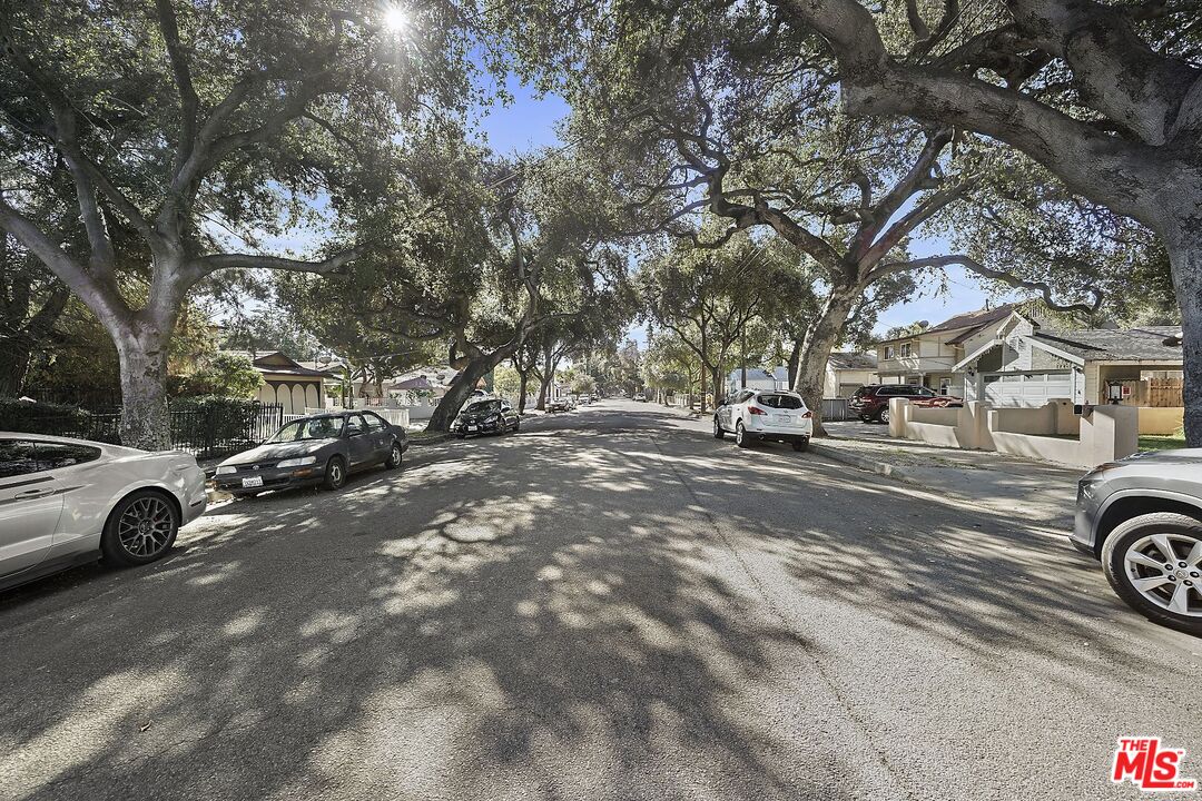 1945 Summit Avenue Pasadena, CA 91103 - Photo 2 of 15 a view of street with parked cars