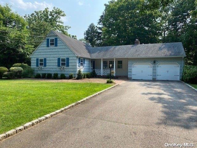 239 West Neck Road Huntington, NY 11743 - Photo 1 of 1 a front view of house with yard and green space