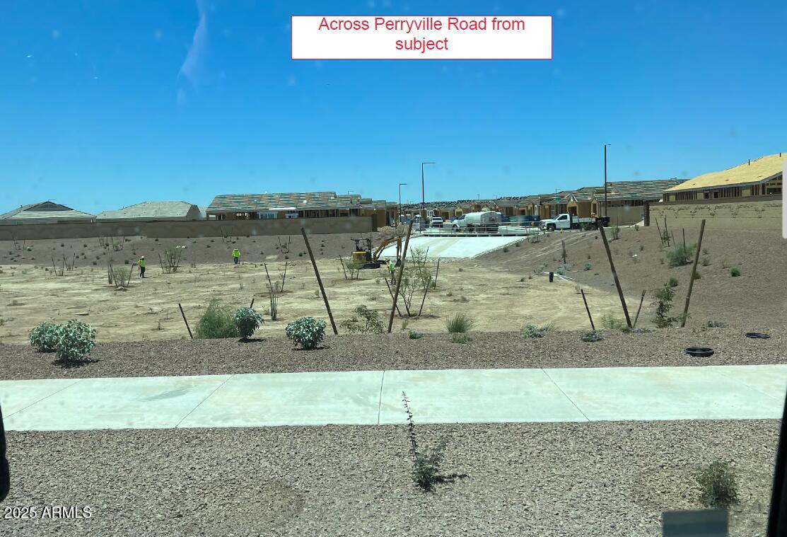 219 North Perryville Road Goodyear, AZ 85338 - Photo 4 of 6 a view of a lake