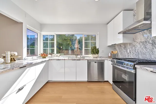 a bedroom with a bed and a table