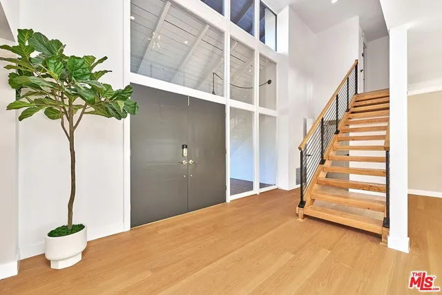 a view of a backyard with sitting area