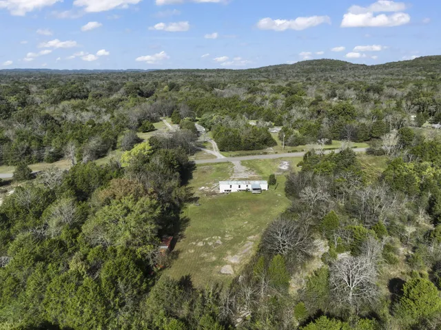 a view of mountain with lake view