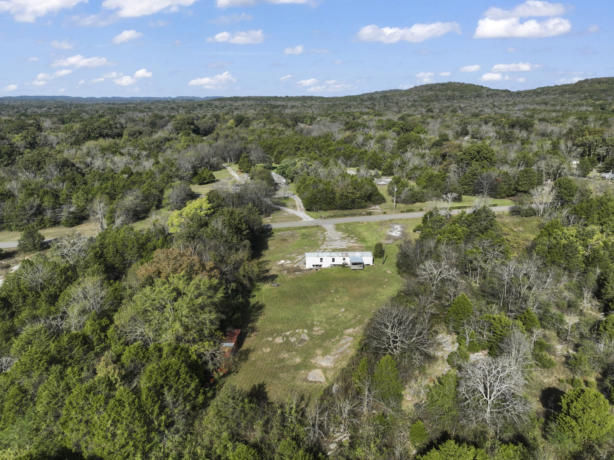 a view of mountain with lake view
