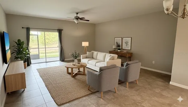 a living room with furniture and a window