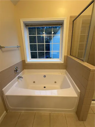 a bathroom with a bathtub