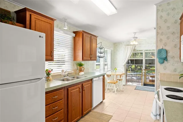 a view of a kitchen and dining room