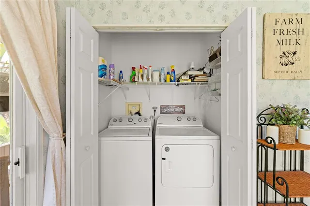 a dining room with furniture window and wooden floor