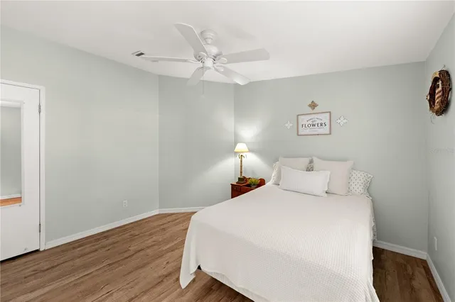 a workspace with furniture and wooden floor