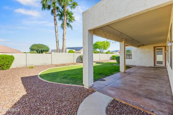 a view of a backyard with garden