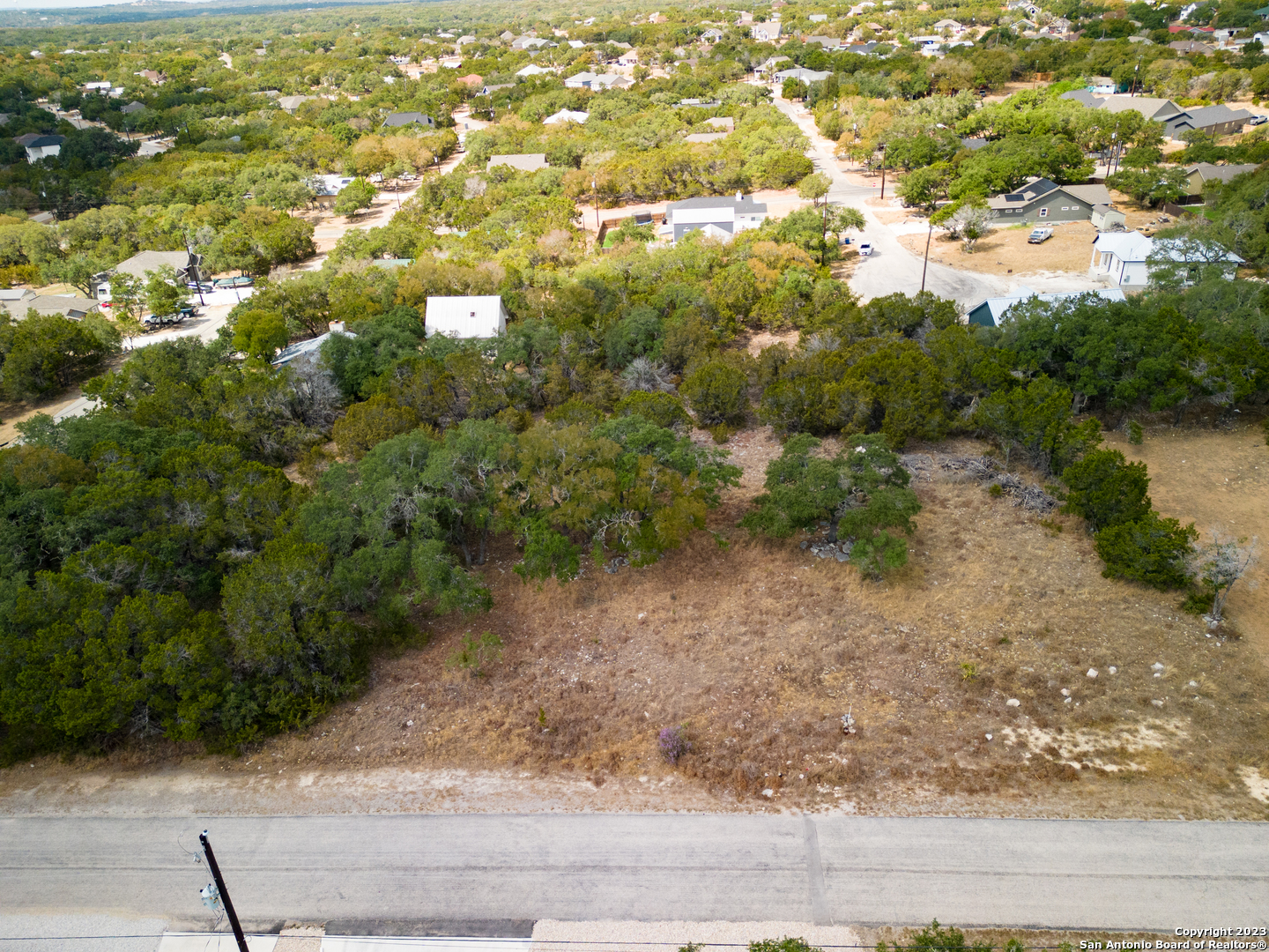 661 Jonquil Drive Spring Branch, TX 78070 - Photo 1 of 1 a view of a yard with plants