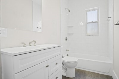 12 Redfield Street, Unit 3 Boston, MA 02122 - Photo 12 of 13 a bathroom with a sink a toilet and shower