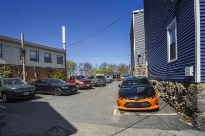 12 Redfield Street, Unit 3 Boston, MA 02122 - Photo 13 of 13 a car parked in front of a house