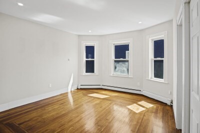 12 Redfield Street, Unit 3 Boston, MA 02122 - Photo 9 of 13 a view of an empty room with window