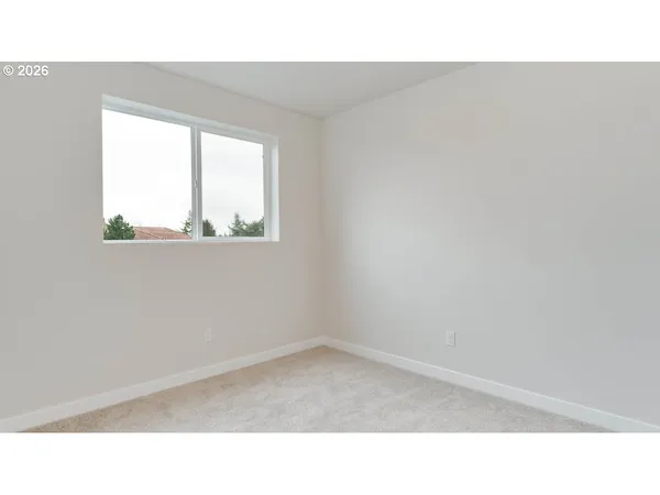 a open living room with a hallway