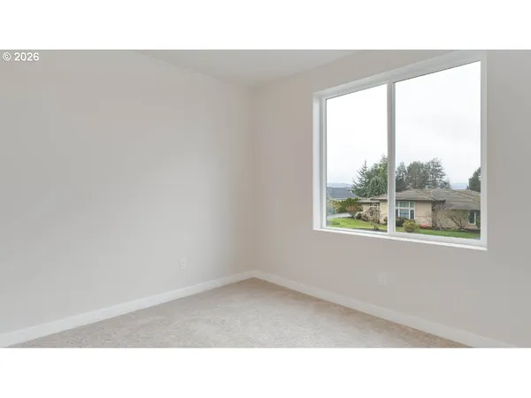 a open living room with a hallway