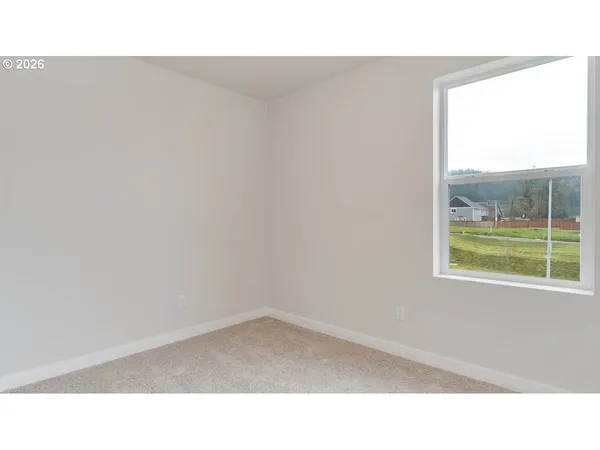 a open living room with a hallway
