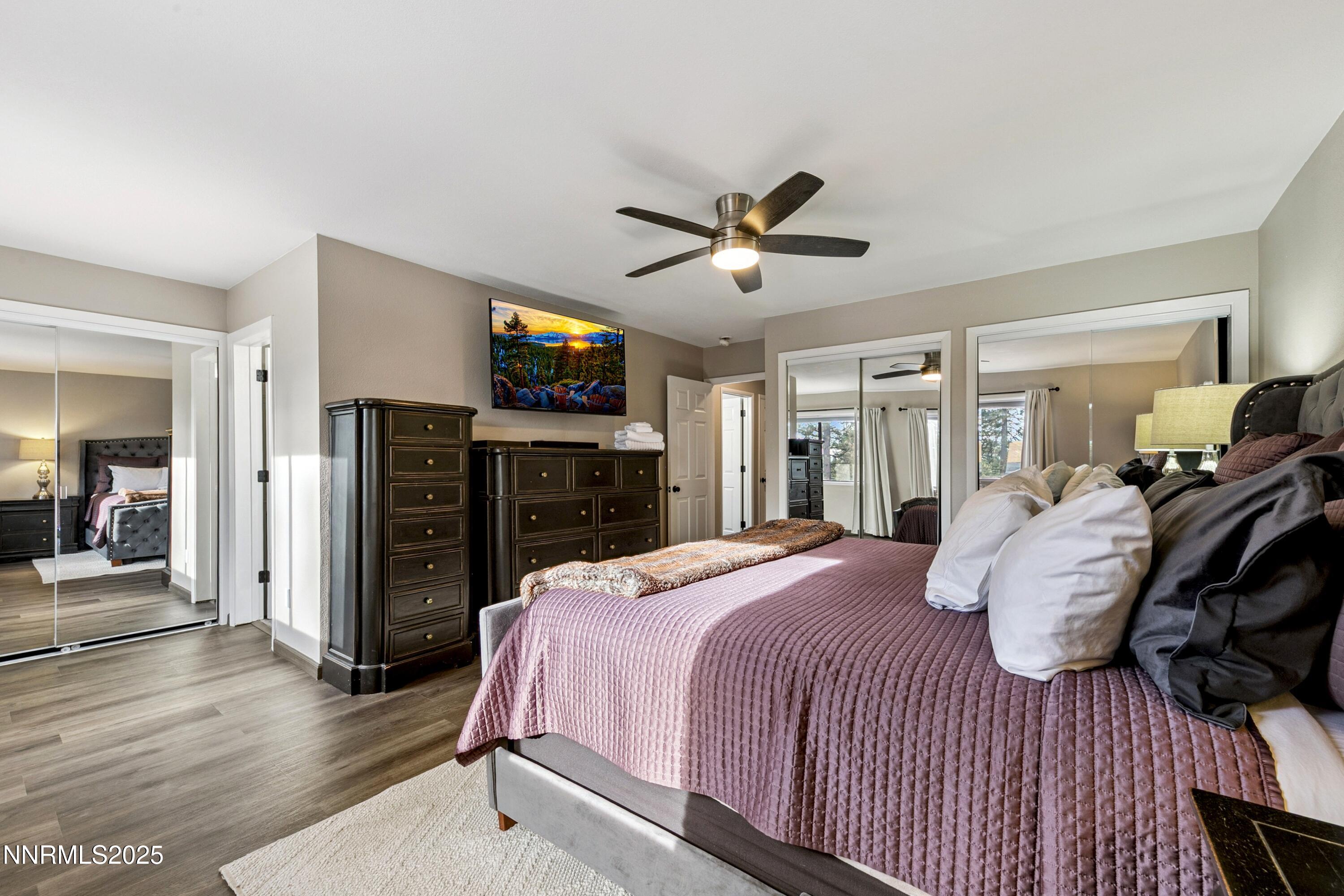 301 Chimney Rock Road Stateline, NV 89449 - Photo 14 of 38 a bedroom with a bed and a flat screen tv