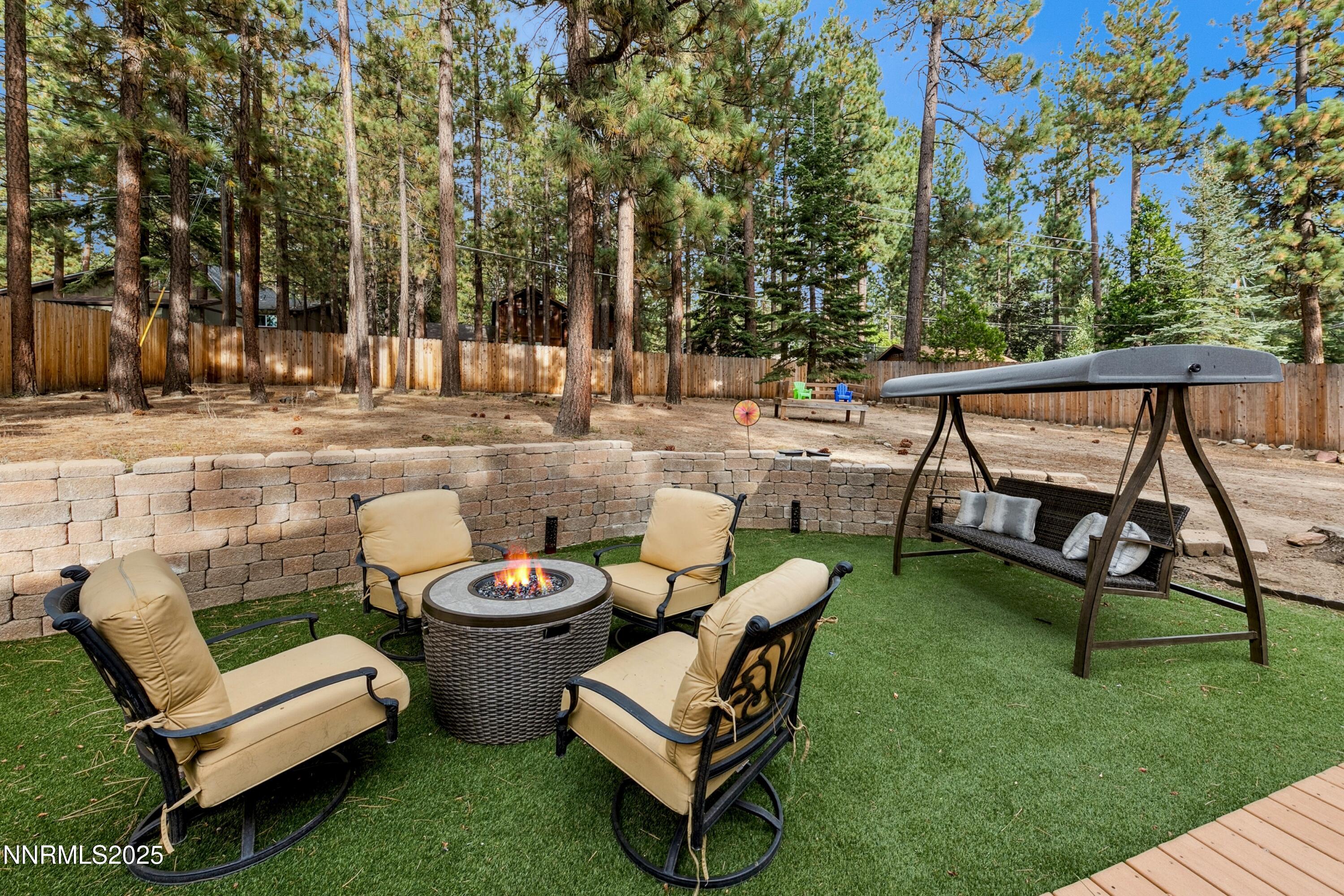 301 Chimney Rock Road Stateline, NV 89449 - Photo 24 of 38 a view of a backyard with sitting area