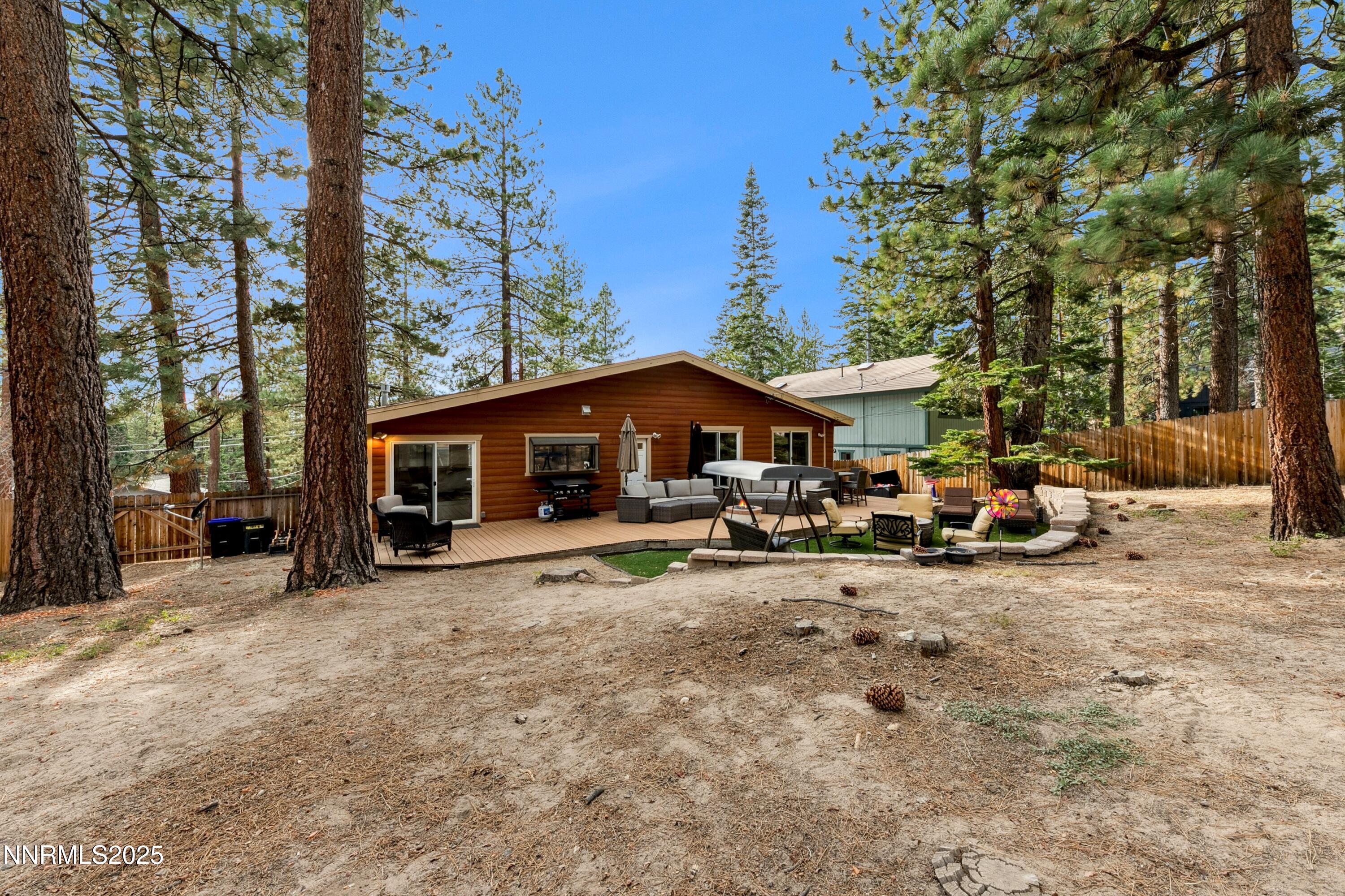 301 Chimney Rock Road Stateline, NV 89449 - Photo 27 of 38 a view of a house with a yard covered in snow