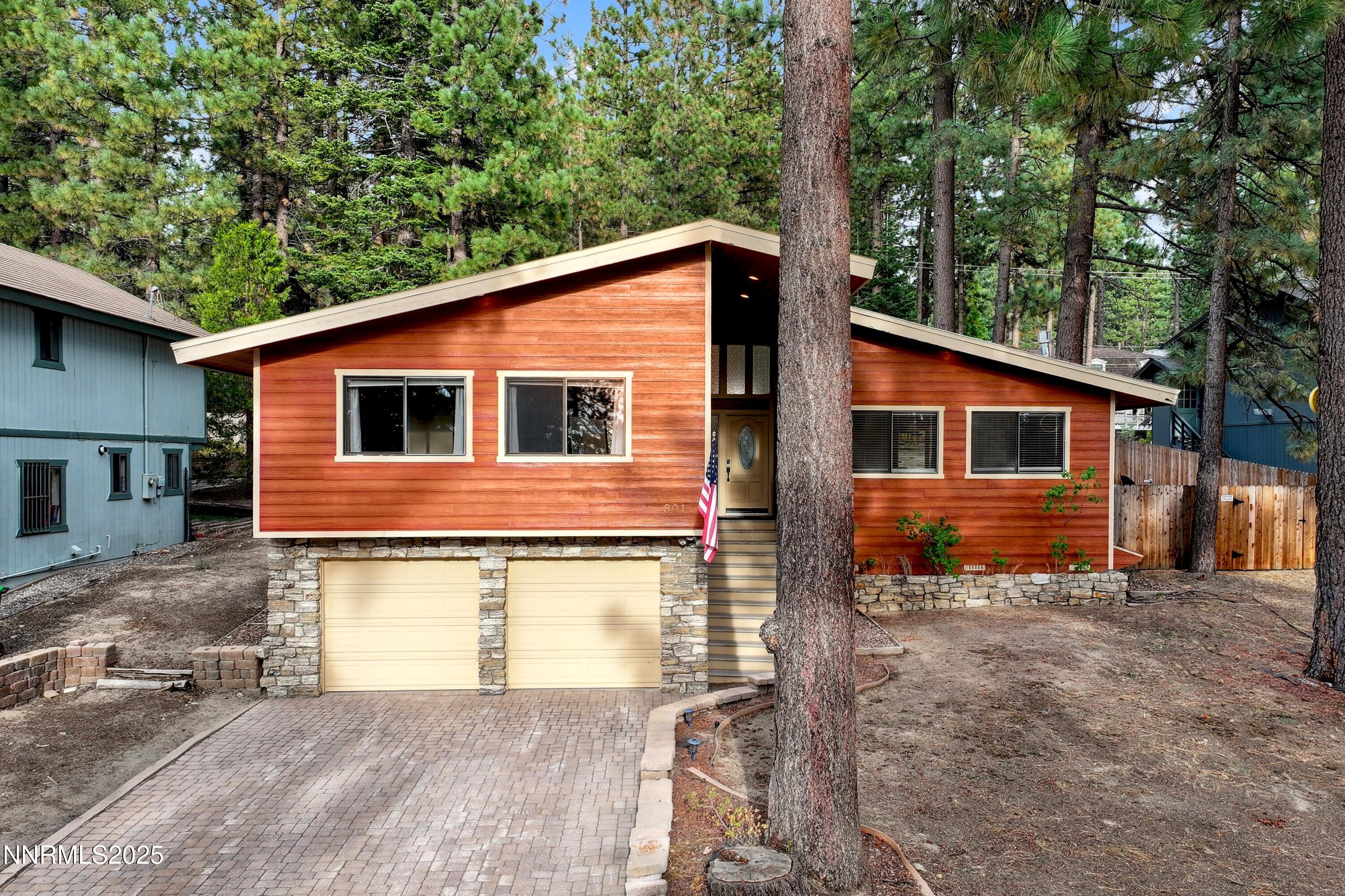 301 Chimney Rock Road Stateline, NV 89449 - Photo 29 of 38 a backyard of a house with seating space