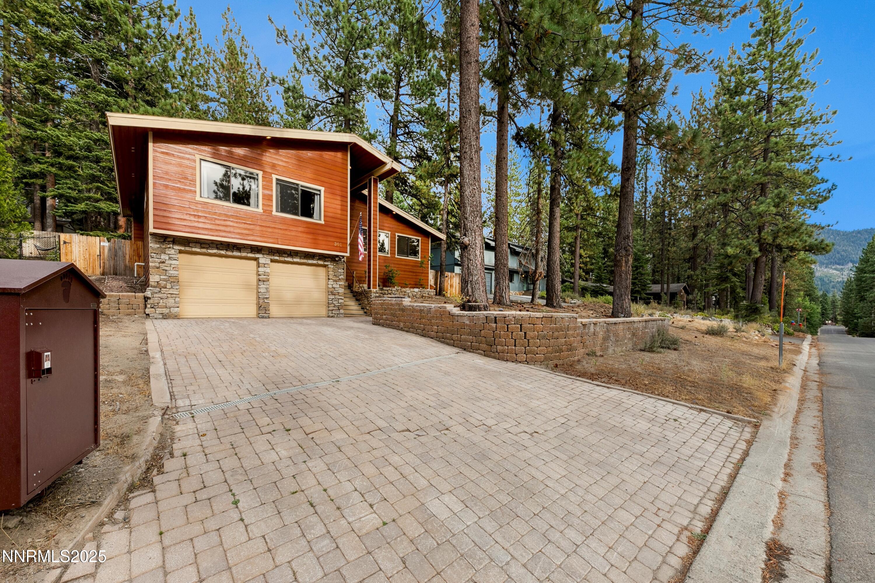 301 Chimney Rock Road Stateline, NV 89449 - Photo 30 of 38 a house with trees in front of it