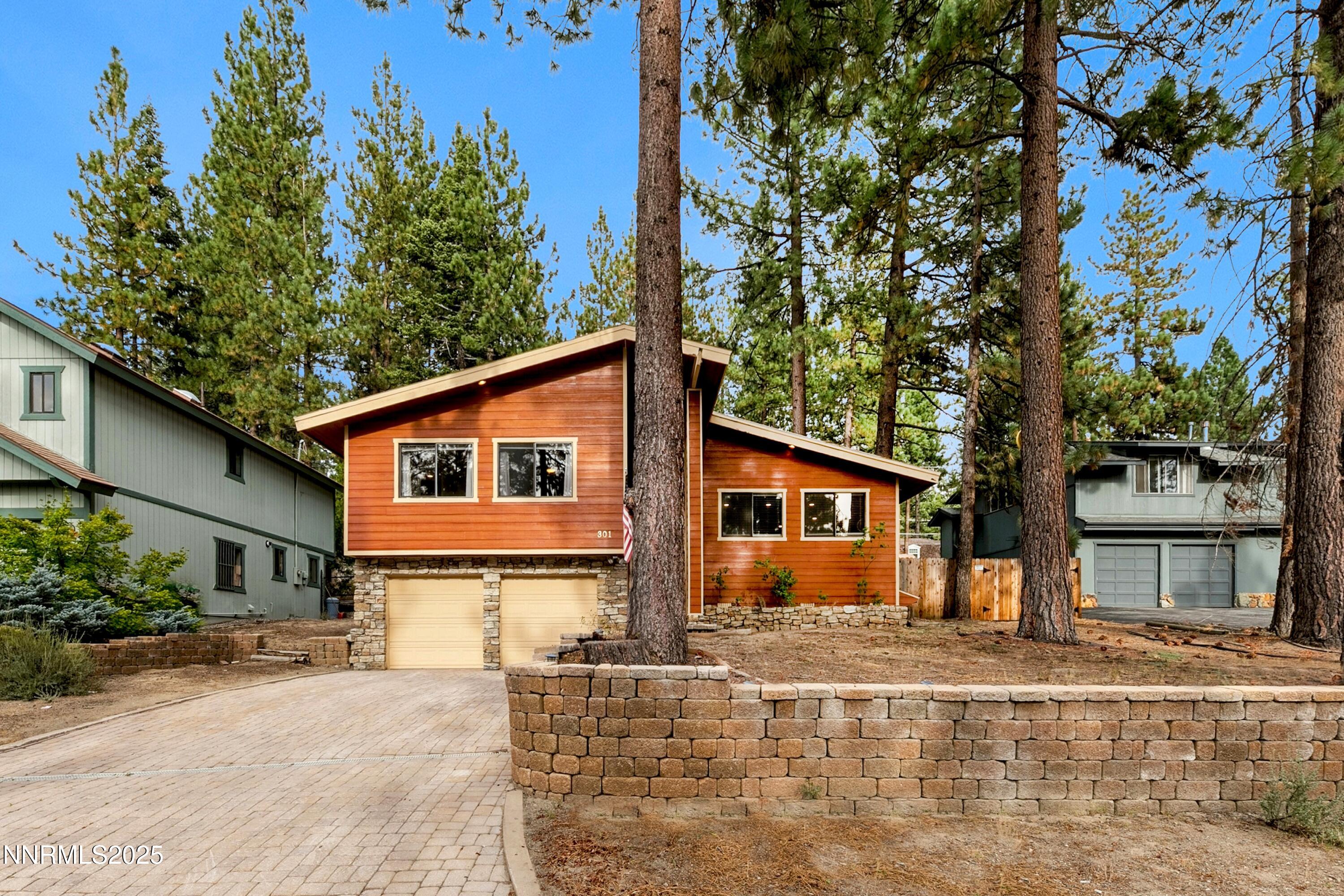 301 Chimney Rock Road Stateline, NV 89449 - Photo 31 of 38 front view of a house with a yard