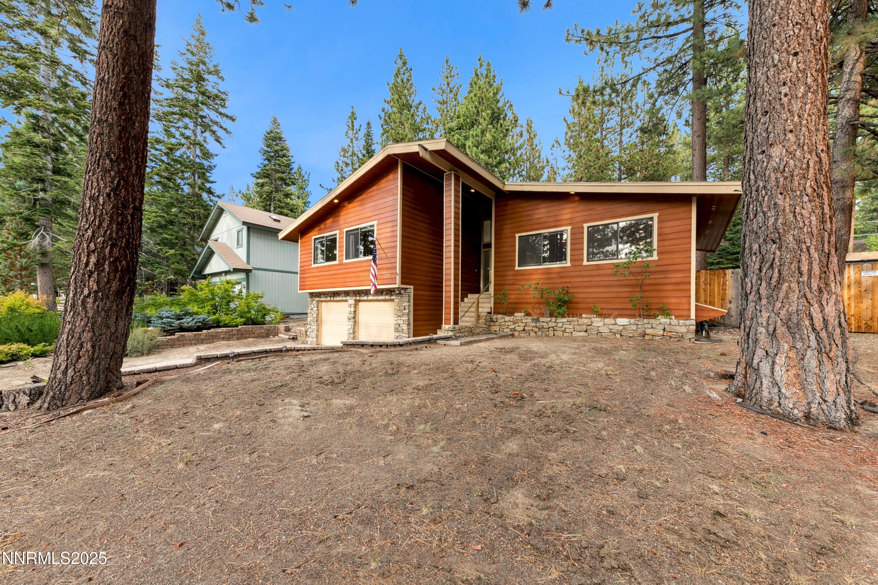 301 Chimney Rock Road Stateline, NV 89449 - Photo 37 of 38 front view of a house with a yard